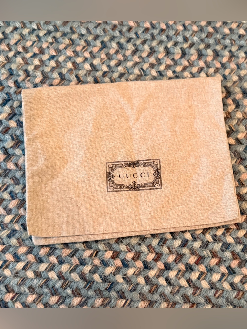 Gucci envelope-style dust bag